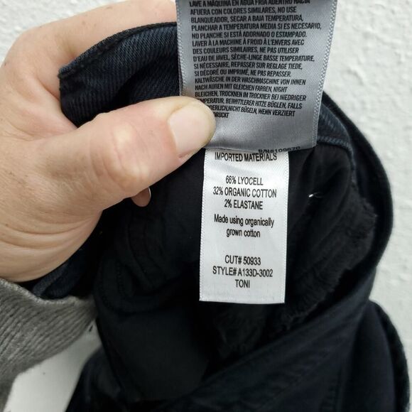 AGOLDE Toni Mid Rise Straight Raw Hem In feral Revolve Jeans - Picture 14 of 16